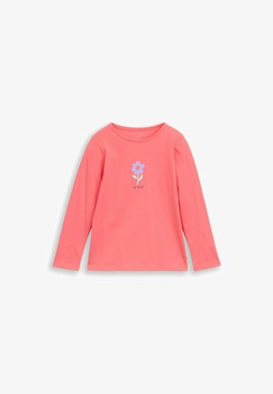 Korallfarbenes Langarmshirt mit rundem Ausschnitt, mit einer kleinen lila Blume und dem Text "Be Kind" zentriert auf der Vorderseite.