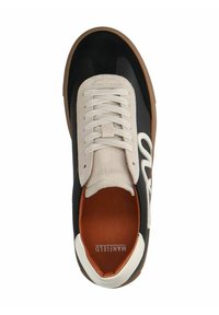 Black sneaker with white laces and logo, featuring a smooth leather upper, textured toe cap, and a brown rubber sole.