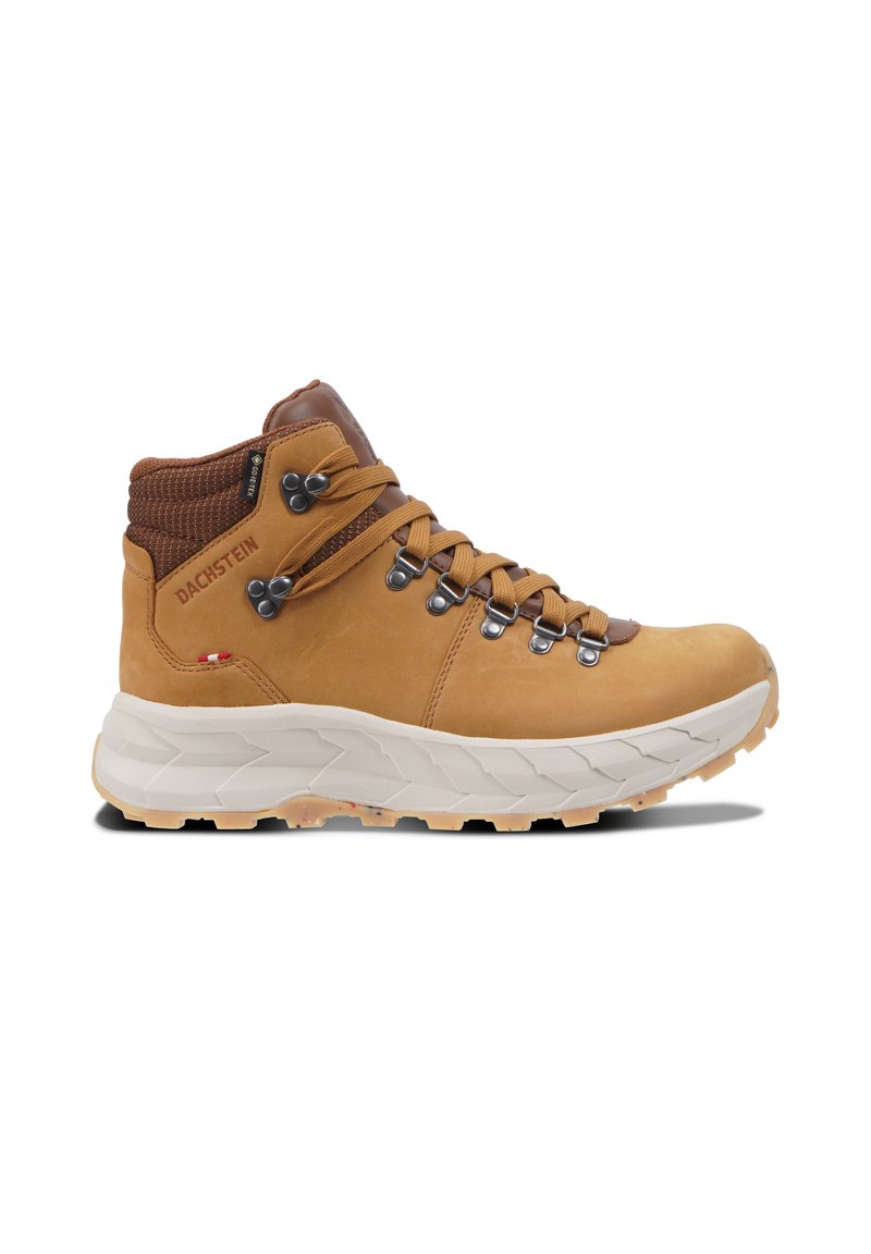 Brown leather hiking boot with a textured upper, round logo patch, metal eyelets, and a cushioned white rubber sole.
