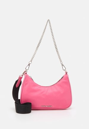Bright pink shoulder bag with silver chain strap, black adjustable fabric strap, and "Steve Madden" logo on front.