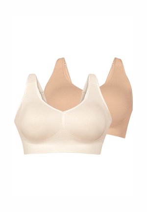 Due reggiseni senza ferretto beige e beige chiaro con spalline larghe e coppe senza cuciture su sfondo bianco.