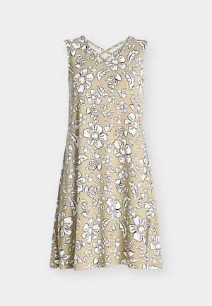 Mouwloze beige jurk met witte en zwarte bloemenprint en gekruiste bandjes bij de V-hals, losse A-lijn silhouet.