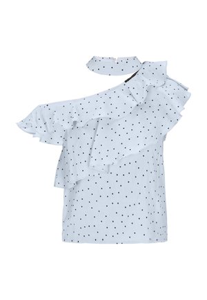 Hellblaues Oberteil mit schwarzen Punkten, das über ein asymmetrisches Rüschendesign und einen hohen Kragen verfügt. Baumwollstoff mit weicher Textur.