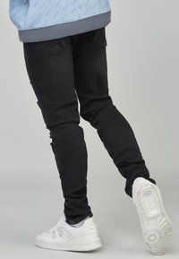 SIKSILK Vaqueros slim fit - black