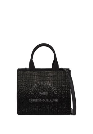 Pequeño bolso rectangular negro con asas cortas y una correa de hombro desmontable, decorado con texto brillante y cuentas.