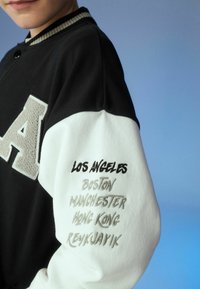 Next VARSITY - Geacă bomber - black skate