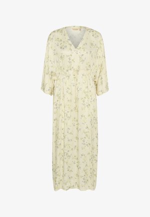 Peegelkleit pehmes kollases kangas, millel on V-kujuline kaelus, lühikesed varrukad, elastne vöökoht köiega ja väikesed rohelised ja hallid lillemustrid.