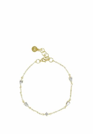 Delicate gold chain bracelet with five small, clear teardrop and round gemstones evenly spaced and a gold lobster clasp with extension links.