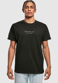Merchcode MÄNNER LOVE YOURSELF FIRST - T-shirt print - black
