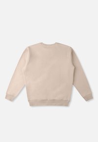 Bež dukserica s okruglim izrezom, rebrastim manšetama i rubom. Glatka tekstura, minimalni šavovi i jednostavan dizajn. Bez vidljivih oznaka ili uzoraka.