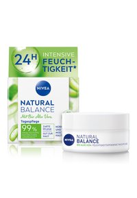 NIVEA Natural Balance moisturizer in a white jar with a blue label, alongside a green box featuring aloe vera and moisture details.