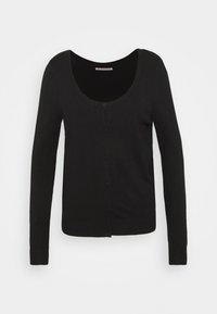 Svart cardigan med rundad halsringning, långa ärmar och knäppning. Har ribbade muddarna och nederdelen. Slät textur, lättstickat material.