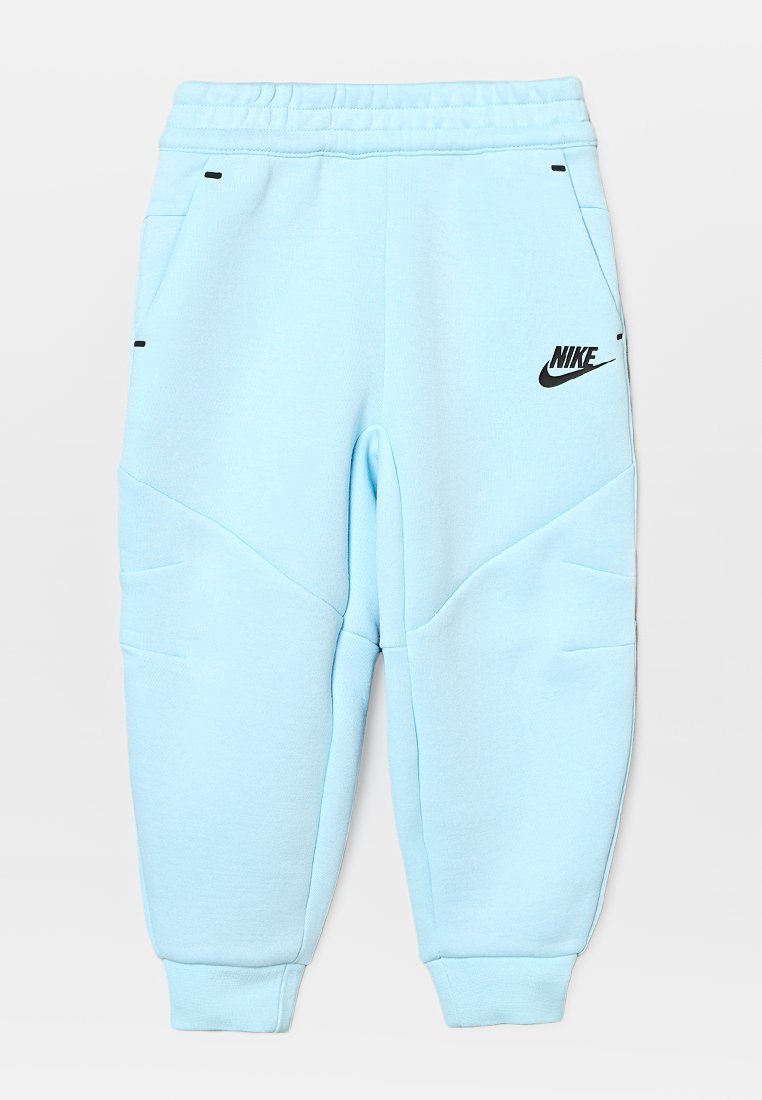 Pantalons de jogging Nike bleu clair en tissu doux, dotés d'une taille élastique, de poches latérales et d'accents de logo noirs.