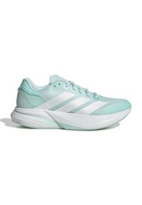 Zapatillas de correr de un verde menta claro con rayas blancas, parte superior de malla, cuello acolchado y suela gruesa y texturizada con la marca "LIGHTSTRIKE".