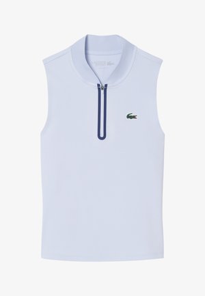 Mouwloos lichtblauw poloshirt met een korte ritssluiting aan de voorkant en het groene Lacoste krokodillenlogo op de linkerborst.