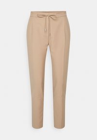 Beige op maat gemaakte broeken met een koordtaille, een gladde textuur en taps toelopende pijpen. Voorzien van zijzakken en accenten in zilverkleurige hardware.