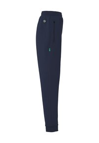 Marineblauwe sweatpants met een comfortabele pasvorm, gemaakt van zacht stof. Voorzien van een trekkoord in de taille, ritszakken en elastische boorden bij de enkels.