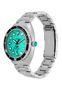 Montre de plongée Fossil avec un bracelet en acier inoxydable, cadran turquoise, lunette noire, marqueurs d'heure luminescents et affichage de la date à 6 heures. Étanche jusqu'à 200 m.