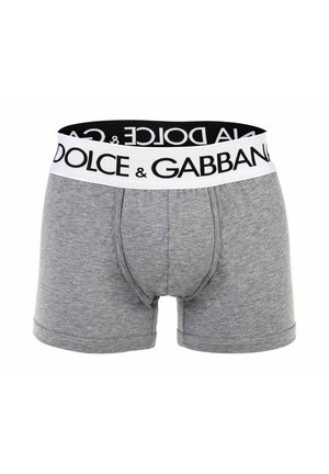 Grijze herenboxers met een brede witte tailleband met gedurfde zwarte "Dolce & Gabbana"-branding.