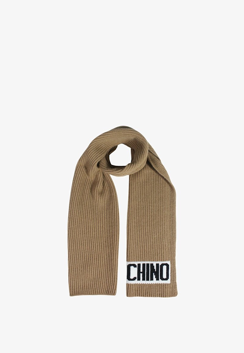 Sciarpa beige a coste realizzata in tessuto a maglia, caratterizzata da un'etichetta nera e bianca con la parola "CHINO" per un tocco di dettaglio.