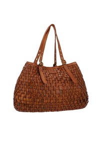 Woven brown leather tote bag with two long straps, featuring a textured surface and circular hardware accents. Spacious and structured design.