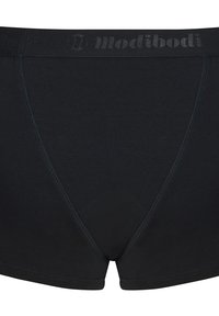 Sous-vêtement noir en tissu doux, doté d'une ceinture élastique avec l'inscription "Modibodi" dans un ton discret, un design à jambes courtes et un détail de couture unique.