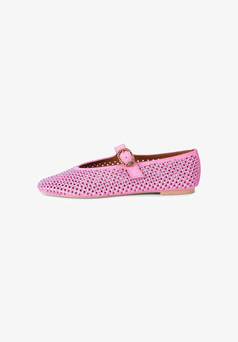 Pink flat Mary Jane shoe with gold buckle and covered in small shiny studs, shown from the side on a white background.