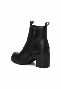XTI Botines - black