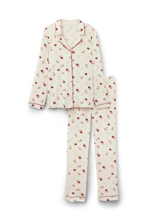 Cream long-sleeve button-up pajama set with red and beige bow and floral prints, featuring red piping on collar, cuffs, and pant hems.