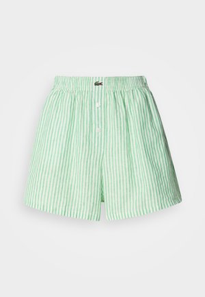 Zöld és fehér csíkos rövidnadrág, rugalmas derékkal, elől gombos záródással és egy kis logóval a derékrészen.