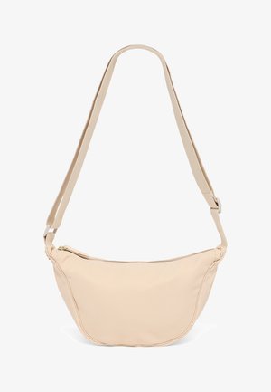 Beige crescent-shaped crossbody bag with adjustable fabric strap and zipper closure on a white background.