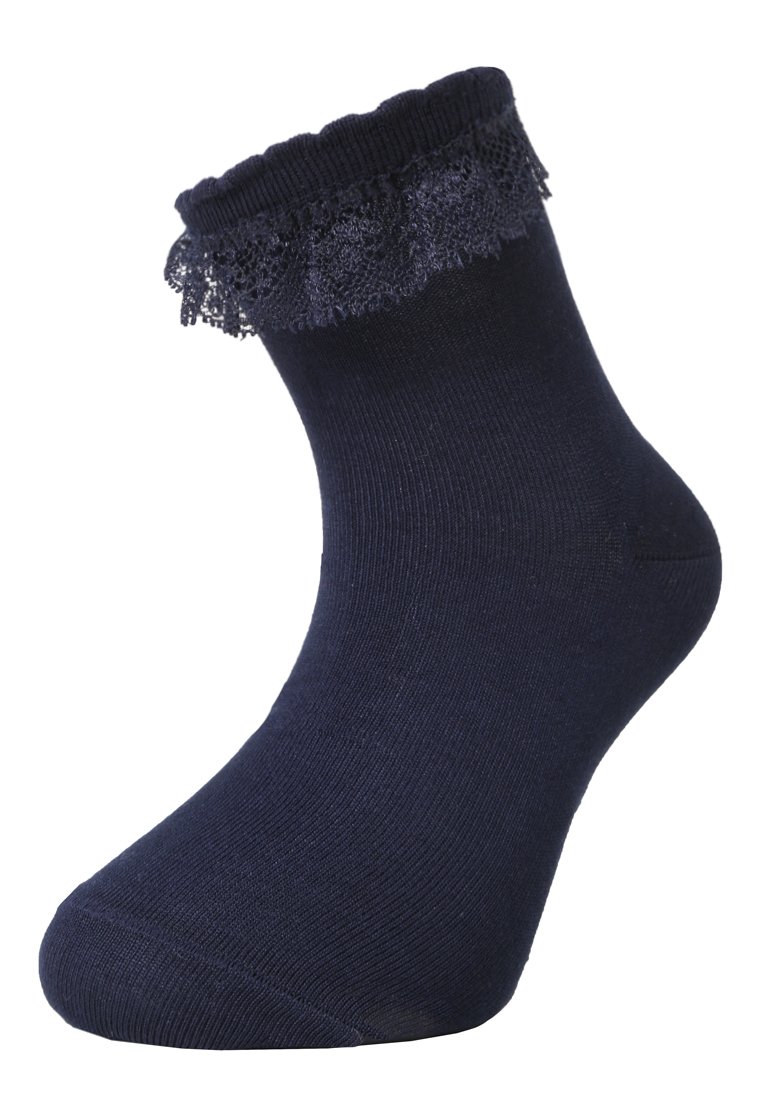 Marineblaue Knöchelsocke mit einem gewellten Spitzenrand oben. Hergestellt aus einem weichen, dehnbaren Material mit einer glatten Textur.