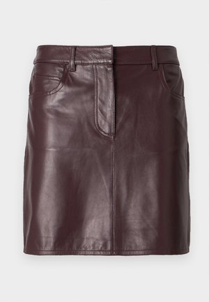 Burgundy leather mini skirt with a smooth texture, front pockets, and belt loops. Features clean lines and a simple design.