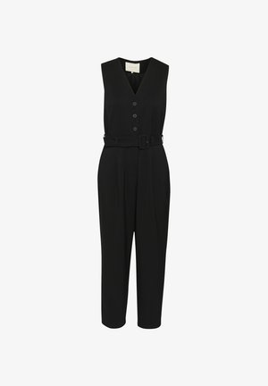 Melna bezpiedurkņu kombinezons ar V-veida kakla izgriezumu, pogu priekšpusi un jostu jostasvietā. Iekļauj šauras kājas un gludu auduma faktūru.