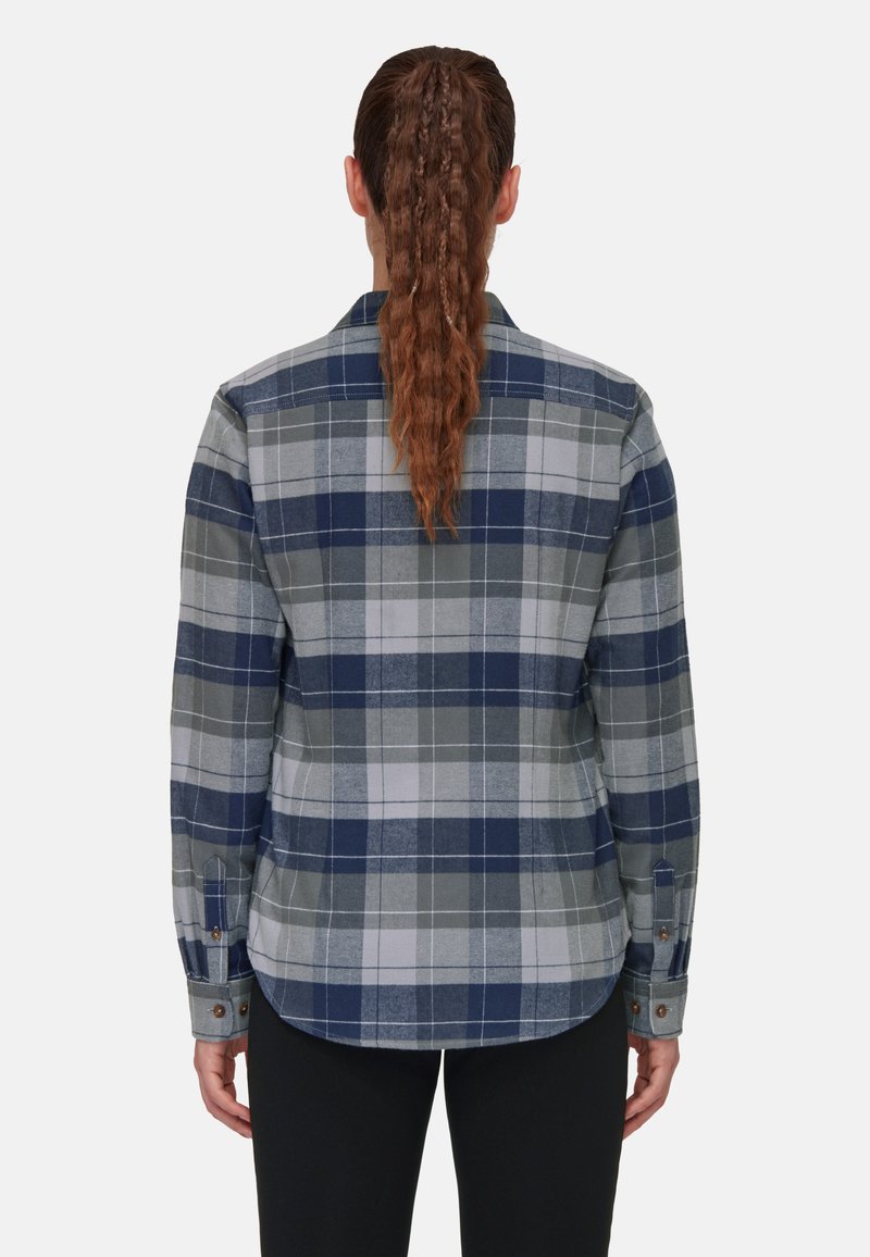 Karierte Flanellhemd in Blau, Grau und Weiß. Mit langen Ärmeln, Knopfmanschetten und einem geschwungenen Saum. Weicher Stoff und strukturierter Kragen.