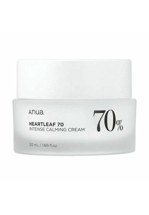 Crema calmante intensa Anua Heartleaf al 70% in barattolo di vetro satinato con coperchio bianco, dimensione 50 mL (1,69 fl. oz.) mostrata.
