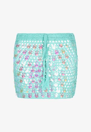 Türkiser Häkel-Überwurf mit schillernden runden Pailletten, mit einer Kordelzugverschluss und Quasten-Details, offenes Gewebe-Design.