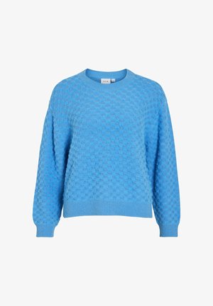 Lyseblå strikket genser med et teksturert, bobleaktig mønster. Har rund hals og ribbestrikkede mansjetter og kant. Avslappet passform.