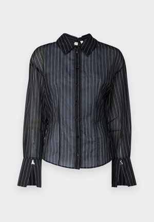 Black sheer blouse with white vertical stripes, classic collar, button front, and flared cuffs. Smooth texture with subtle sheen.