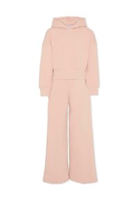 Ensemble en coton rose comprenant un hoodie court avec une poche kangourou et un pantalon large avec une taille élastique.
