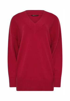 Rød strikket sweater med V-udskæring, dropped skuldre og ribbet kant. Blød tekstur, oversized pasform og sømløs konstruktion.