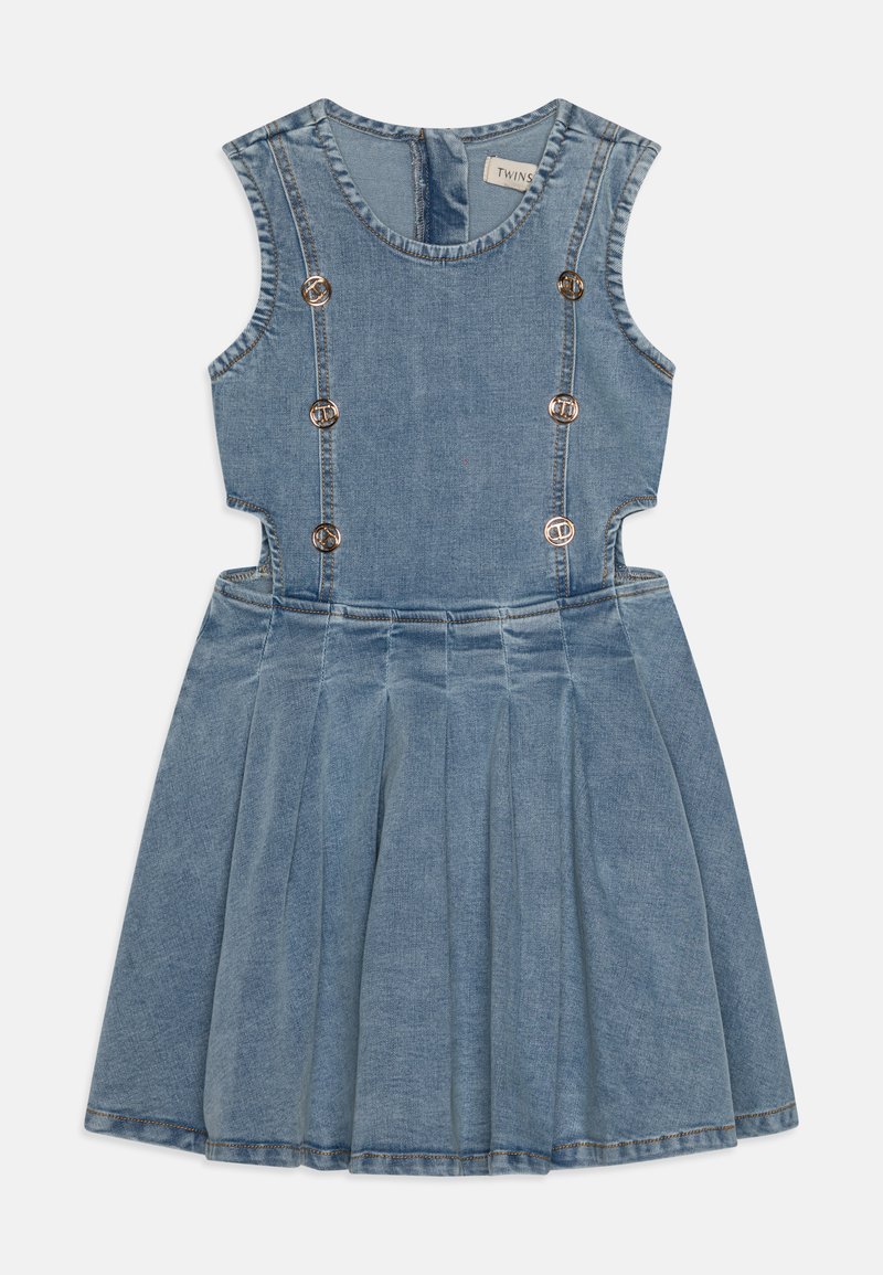Denim dress featuring a sleeveless design, five decorative buttons, a fitted bodice, and a pleated skirt. Color is light blue.