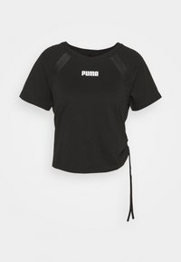 Svart kortärmad t-shirt i mjukt material med rund halsringning och en vit logotyp på framsidan. Har dragsko-detalj på sidan.