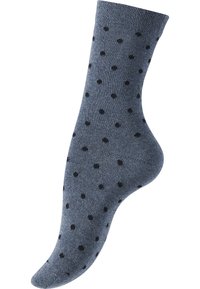 Calza blu con una texture liscia, caratterizzata da un motivo di piccole macchie nere. Il design è alla caviglia con punta arrotondata.