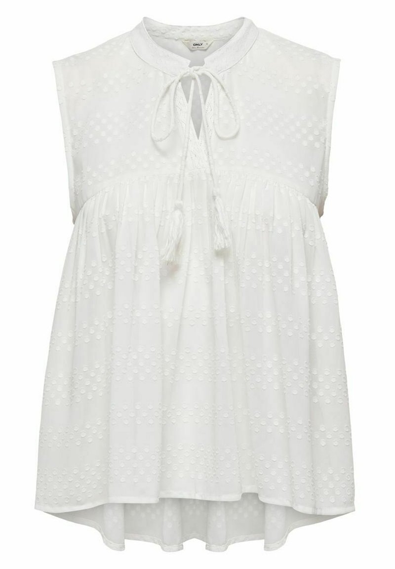 Top blanco sin mangas, con cuello alto, detalle de lazo y un patrón de lunares texturizados. Diseño acampanado con un dobladillo trasero más largo.