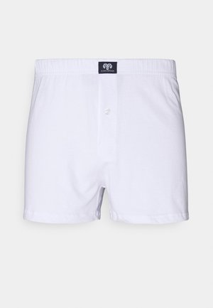 Weiße Baumwoll-Boxershorts mit elastischem Bund, vorderem Knopfverschluss und einem kleinen Markenetikett in der oberen Mitte.