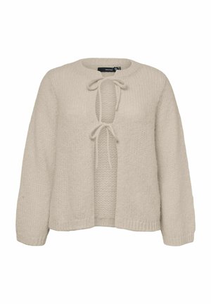 Pull beige en maille avec manches longues, encolure ronde et deux liens à l'avant formant une ouverture en forme de gouttière.