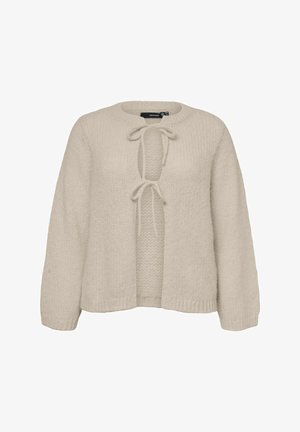 Pull beige en maille avec manches longues, encolure ronde et deux liens à l'avant formant une ouverture en forme de gouttière.