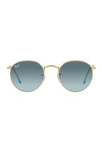 Occhiali da sole rotondi con montatura in metallo dorato, lenti blu sfumate, estremità trasparenti delle stanghette e design a doppio ponte. Dettagli accentati sulle lenti.