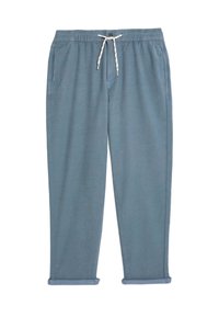 Modré volné kalhoty s elastickým pasem, bílou šnůrkou, bočními kapsami a ohrnutými manžetami, vystavené na bílém pozadí.